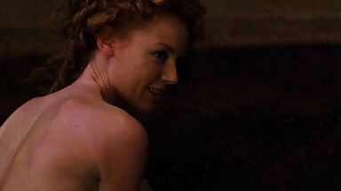 Charlize Theron and Connie Nielsen naked and sex scenes in Devil's Advocate (1997)