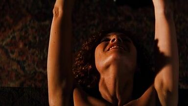 Connie Nielsen naked in Devil's Advocate (1997)