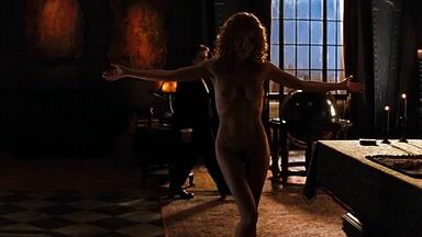 Connie Nielsen naked in Devil's Advocate (1997)