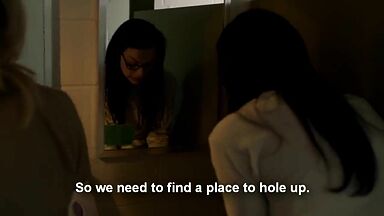 Taylor Schilling and  Laura Prepon as lesbians in Orange Is the New Black