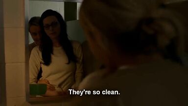 Taylor Schilling and  Laura Prepon as lesbians in Orange Is the New Black