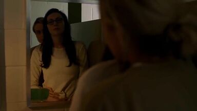 Taylor Schilling and  Laura Prepon as lesbians in Orange Is the New Black