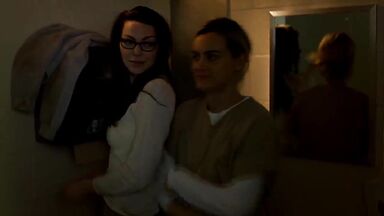 Taylor Schilling and  Laura Prepon as lesbians in Orange Is the New Black