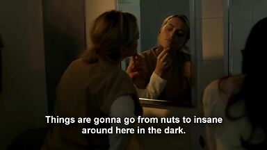 Taylor Schilling and  Laura Prepon as lesbians in Orange Is the New Black