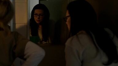 Taylor Schilling and  Laura Prepon as lesbians in Orange Is the New Black