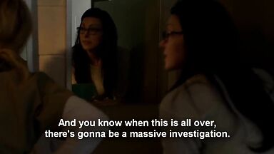 Taylor Schilling and  Laura Prepon as lesbians in Orange Is the New Black