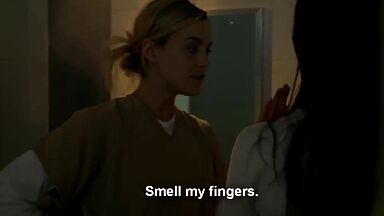 Taylor Schilling and  Laura Prepon as lesbians in Orange Is the New Black