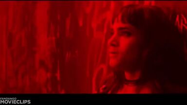 Charlize Theron and Sophia Boutella kissing