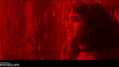 Charlize Theron and Sophia Boutella kissing