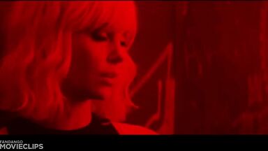 Charlize Theron and Sophia Boutella kissing