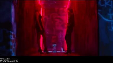 Charlize Theron and Sophia Boutella kissing