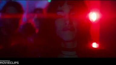 Charlize Theron and Sophia Boutella kissing