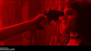 Charlize Theron and Sophia Boutella kissing