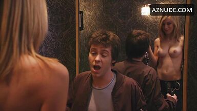 Jennifer Holland shows her breasts