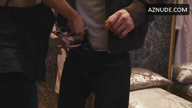 Jennifer Holland shows her breasts