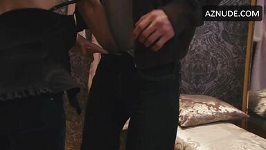 Jennifer Holland shows her breasts