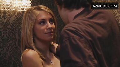 Jennifer Holland shows her breasts