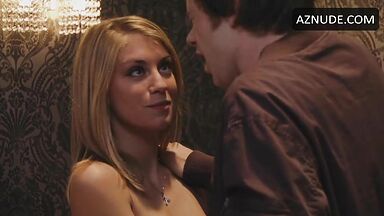 Jennifer Holland shows her breasts