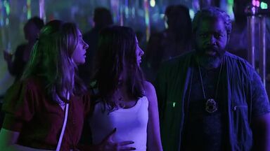 Strippers in dance club