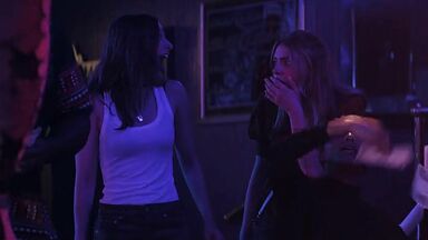 Strippers in dance club