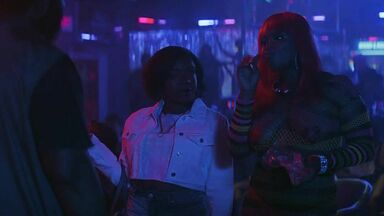 Strippers in dance club