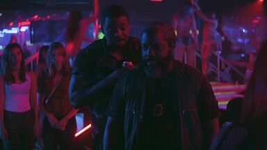 Strippers in dance club