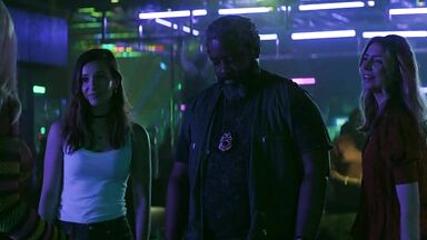 Strippers in dance club