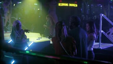 Strippers in dance club