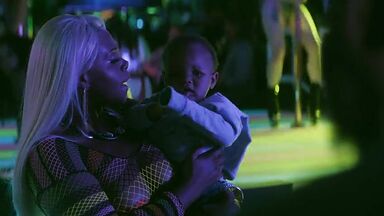 Strippers in dance club