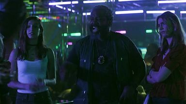 Strippers in dance club