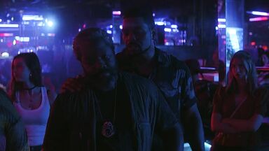 Strippers in dance club