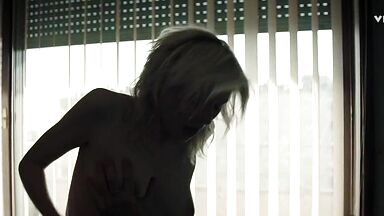 Elizabeth Debickie hot in The Burnt Orange Heresy