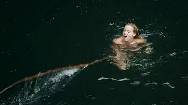 Hot blonde in the water