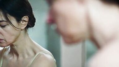 Monica undresses in a public bathroom