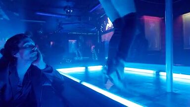 Christian Bale is caged by a sexy blonde