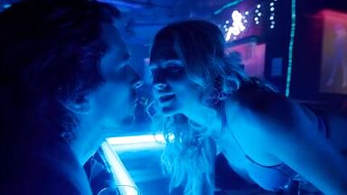 Christian Bale is caged by a sexy blonde