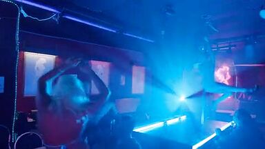 Christian Bale is caged by a sexy blonde