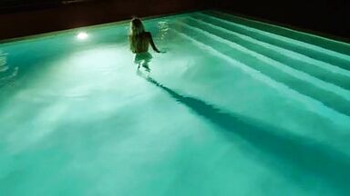 Christian Bale is caged by a sexy blonde