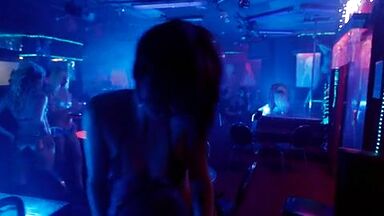 Christian Bale is caged by a sexy blonde