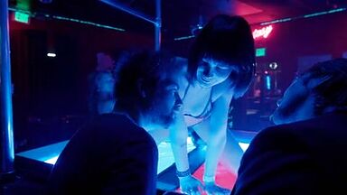 Christian Bale is caged by a sexy blonde