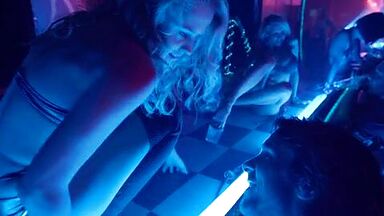 Christian Bale is caged by a sexy blonde