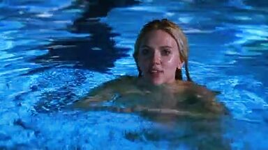 Passionate frenchkiss between Scarlett Johansson and Bradley Cooper