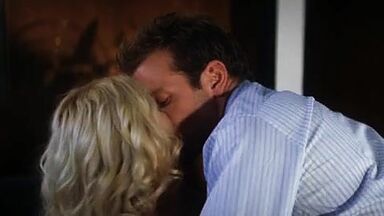 Passionate frenchkiss between Scarlett Johansson and Bradley Cooper