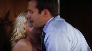 Passionate frenchkiss between Scarlett Johansson and Bradley Cooper