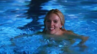 Passionate frenchkiss between Scarlett Johansson and Bradley Cooper