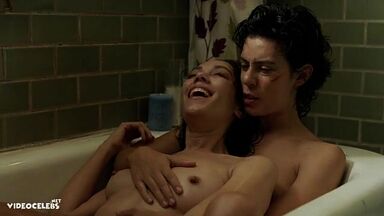 Hot bath in the bathtub with the two hot brunettes