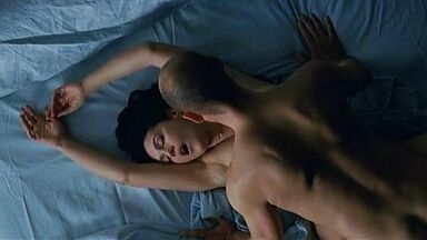 Monica Bellucci nude in How Much Do You Love Me