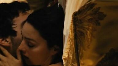 Monica Bellucci nude in Don't Look Back