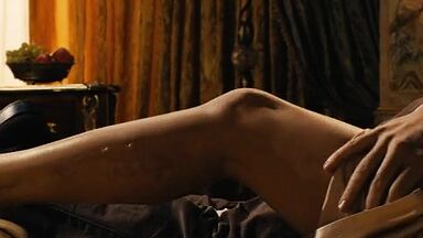 Monica Bellucci nude in Don't Look Back