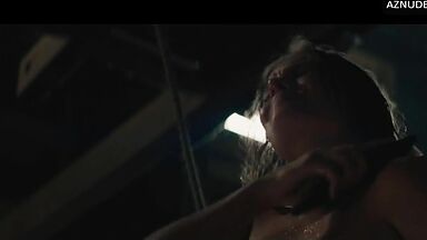 Wild kisses between Margot Robbie and a black man